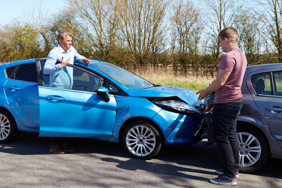 people arguing after an accident in need of Oklahoma City Car Insurance
