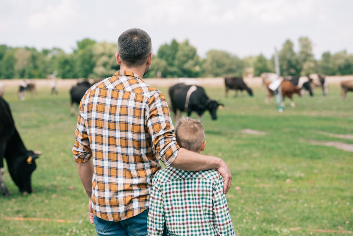 family looking at field of cows with Agriculture Insurance in Shawnee, OK, Choctaw, OK, Prague, OK, Meeker, OK, and Chandler, OK